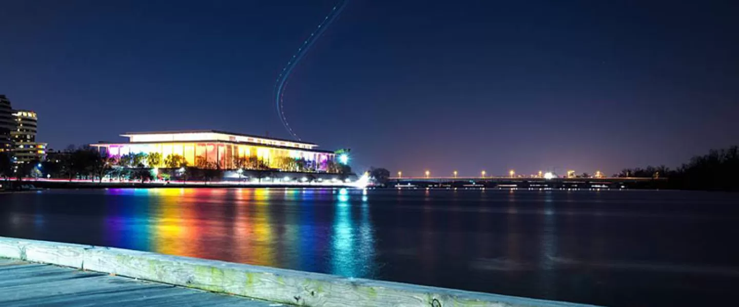 The John F Kennedy Center lit up with rainbow lights